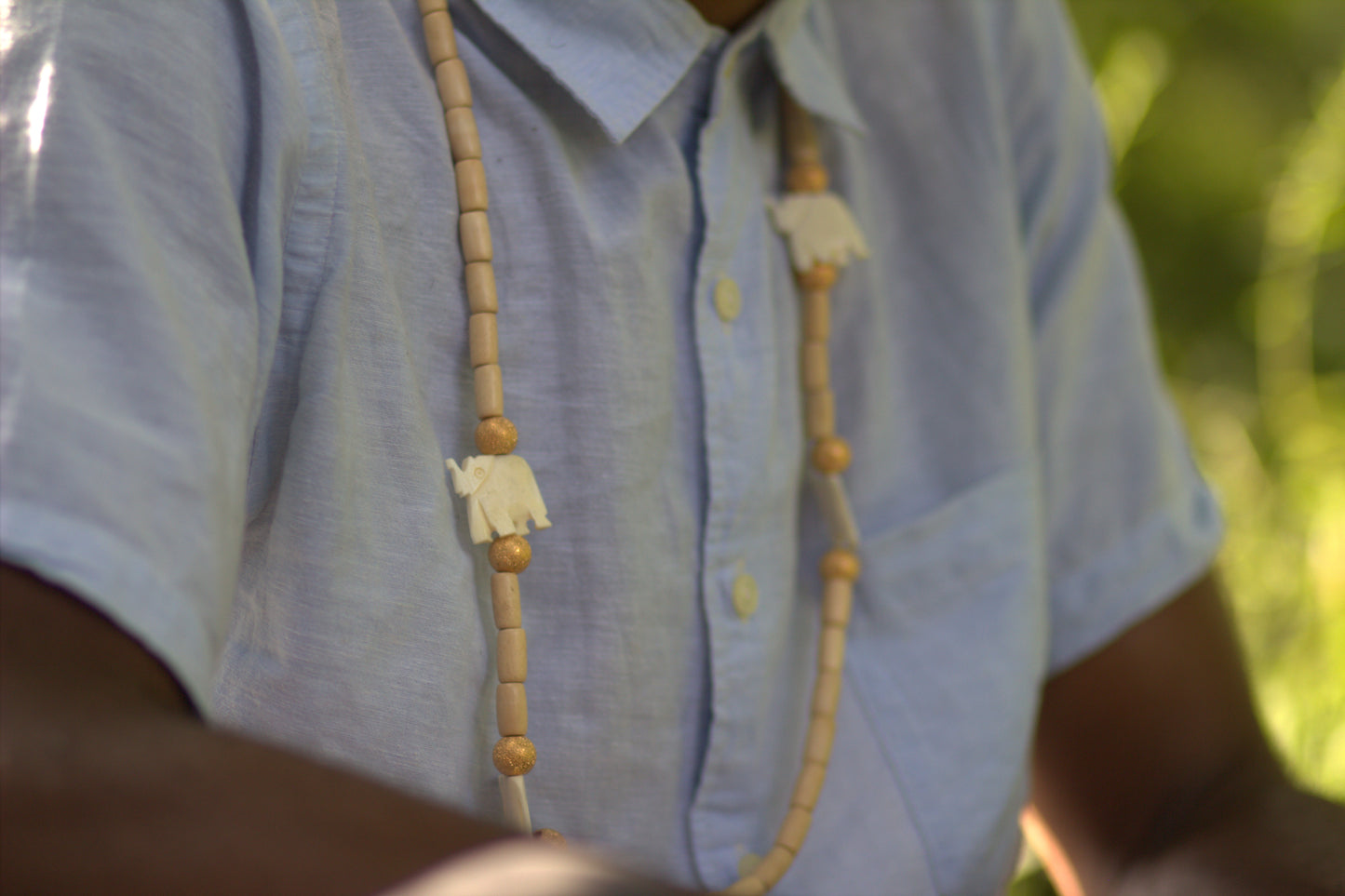 Gold Elephant Herd Necklace image 4