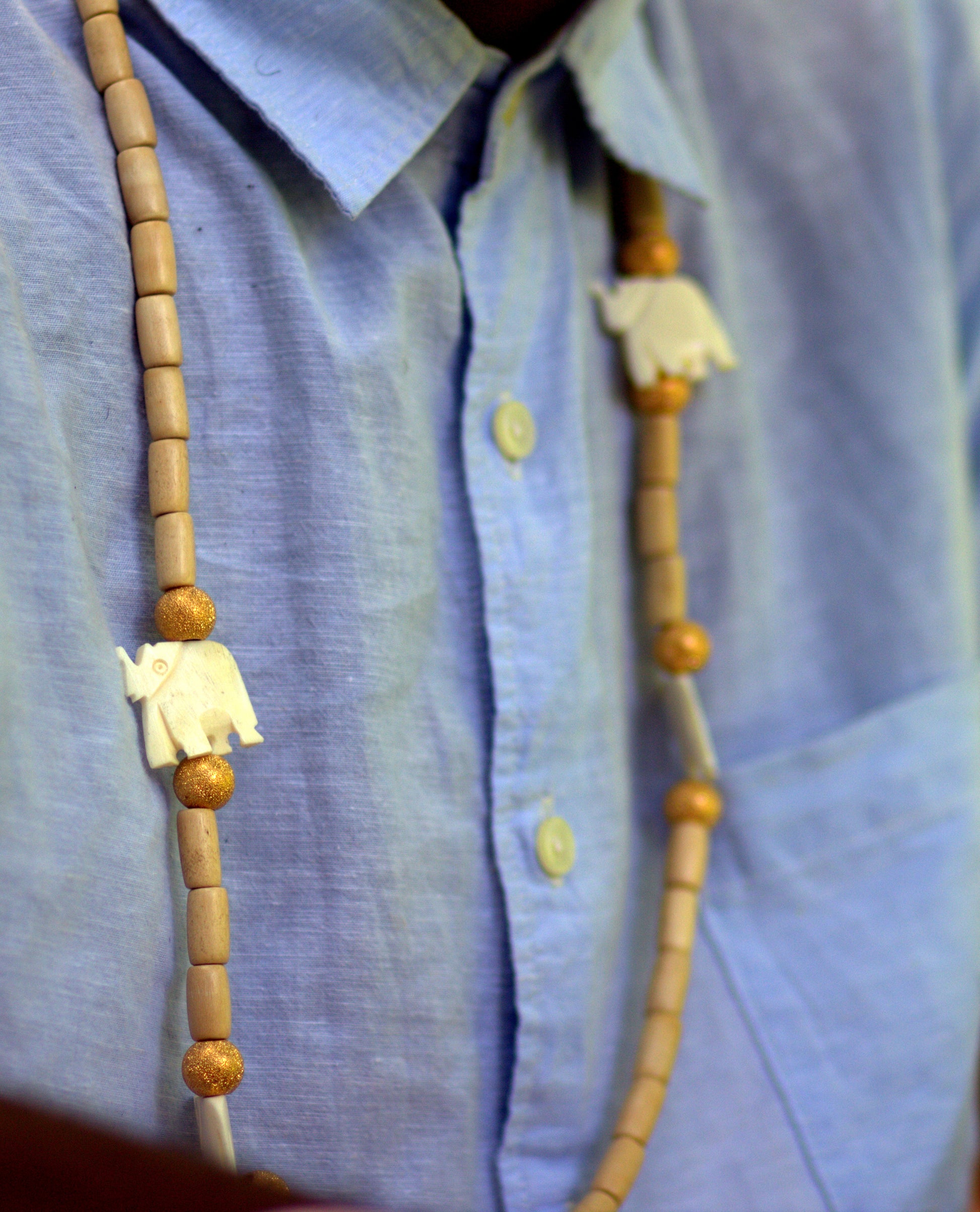 Gold Elephant Herd Necklace image 0