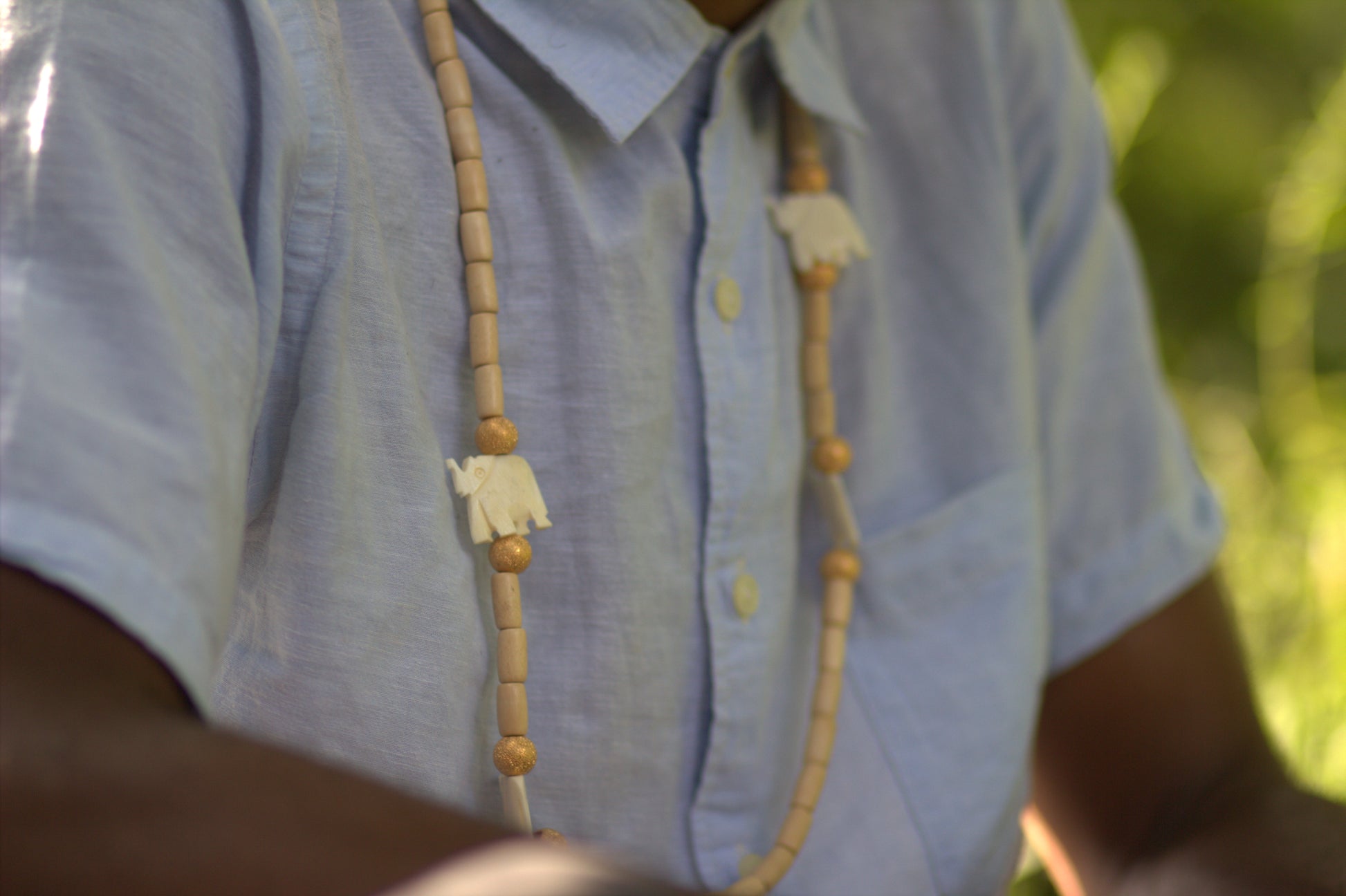 Gold Elephant Herd Necklace image 4