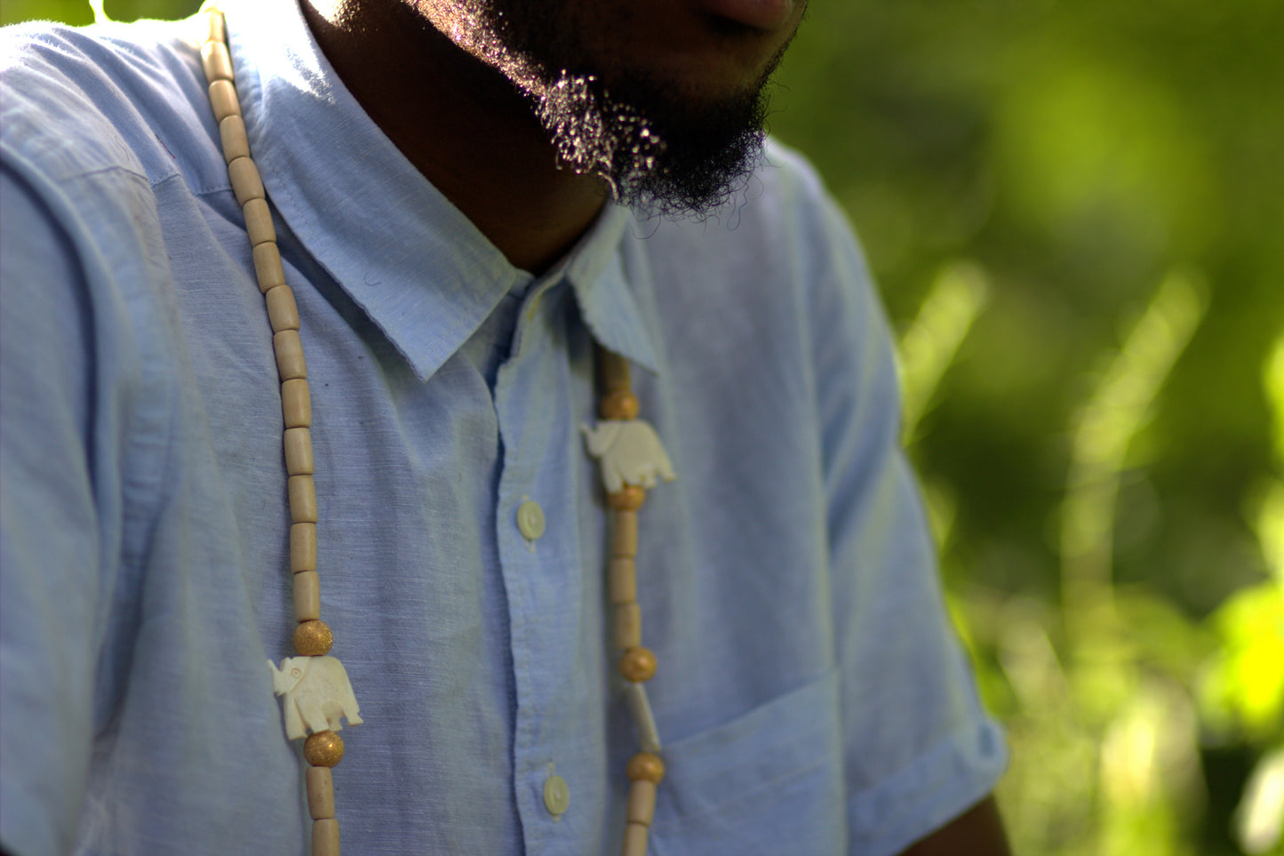 Gold Elephant Herd Necklace image 2